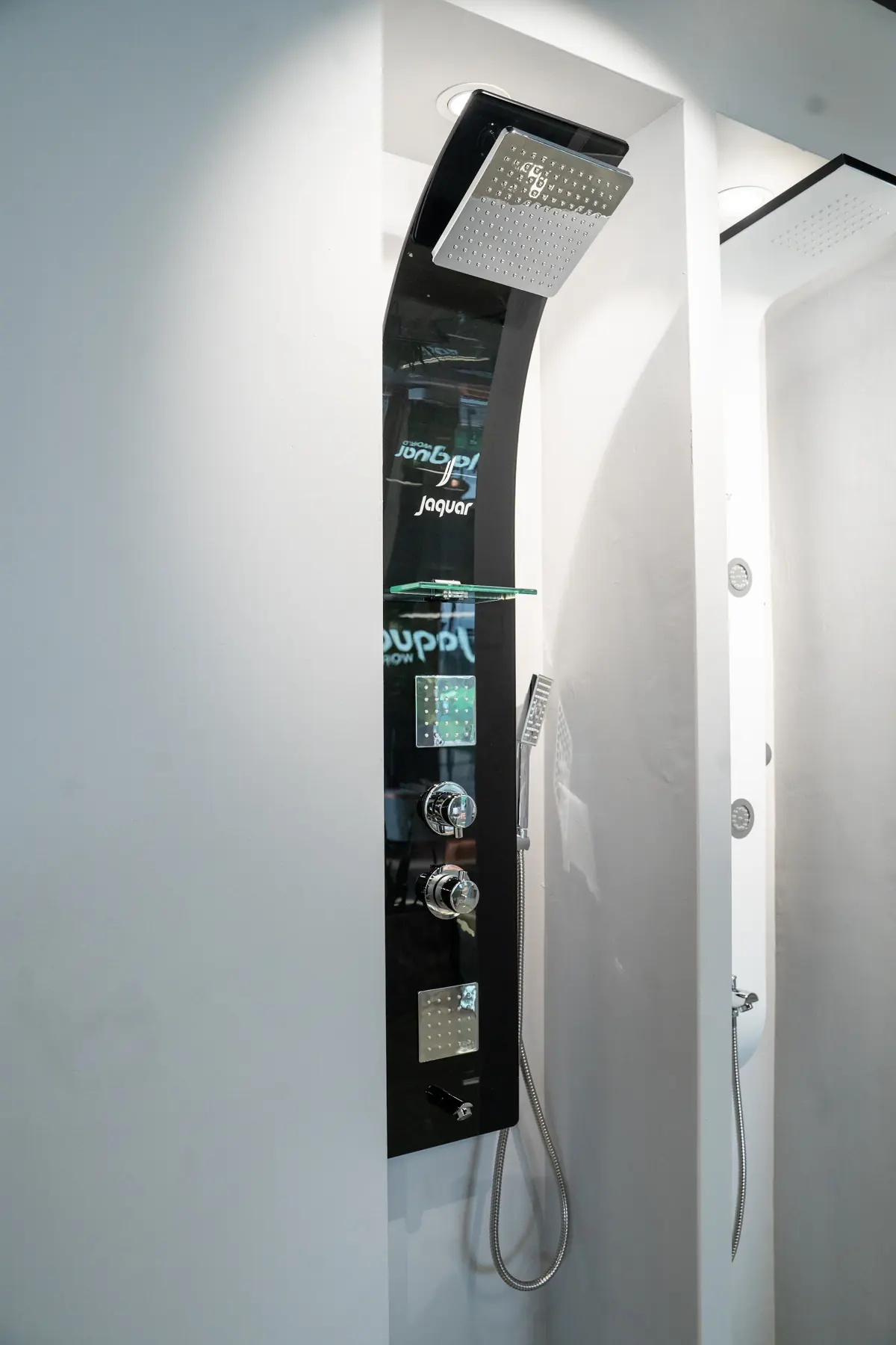 A stainless steel shower panel with body jets